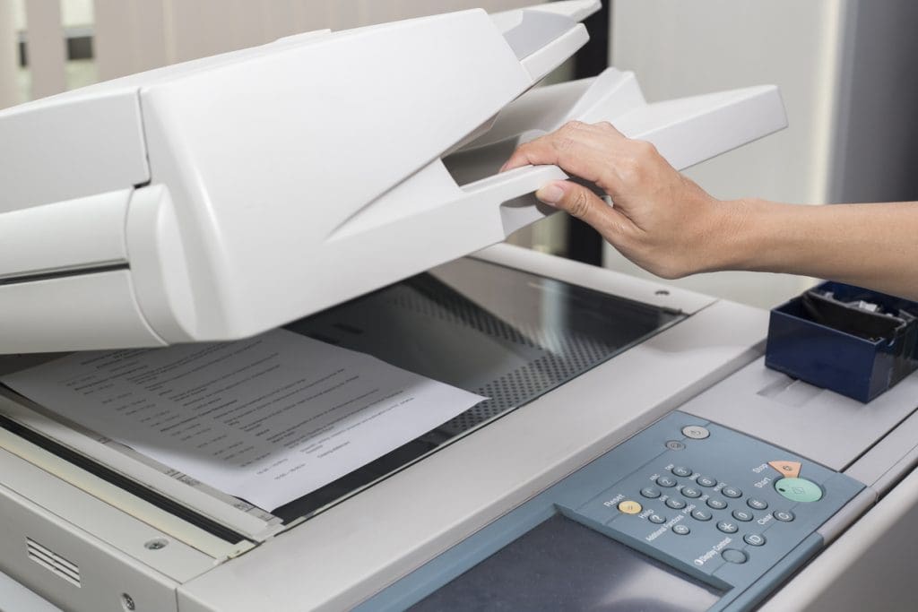 woman-opening-a-photocopier