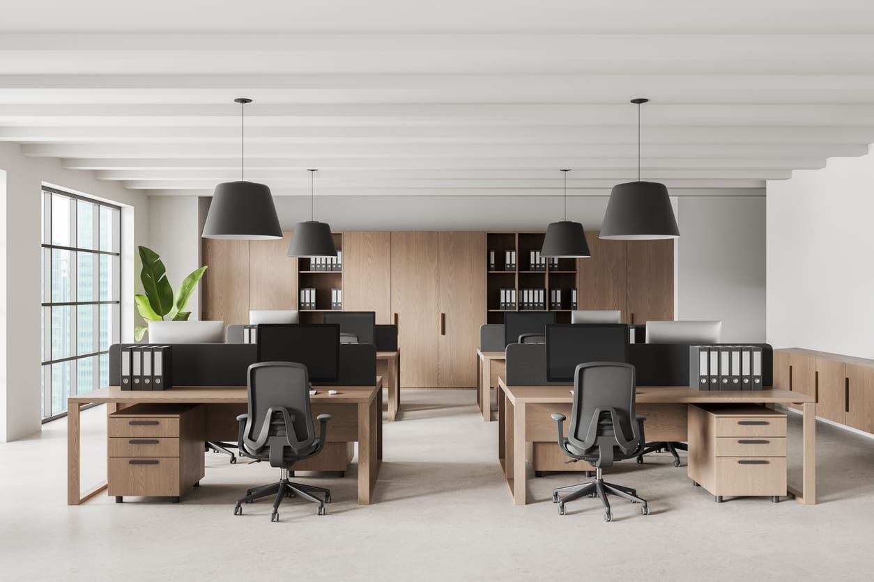 modern-open-plan-office-interior-with-wooden-desks-ergonomic-chairs-pendant-lighting-and-organized-workstations-in-bright-daylight-3d-rendering