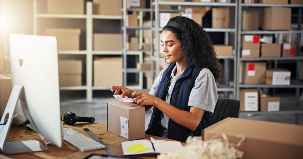 woman-sticker-and-box-for-warehouse-distribution-of-packaging-inventory-management-and-receipt-person-computer-and-parcel-with-label-of-payment-invoice-quality-assurance-and-shipping-information