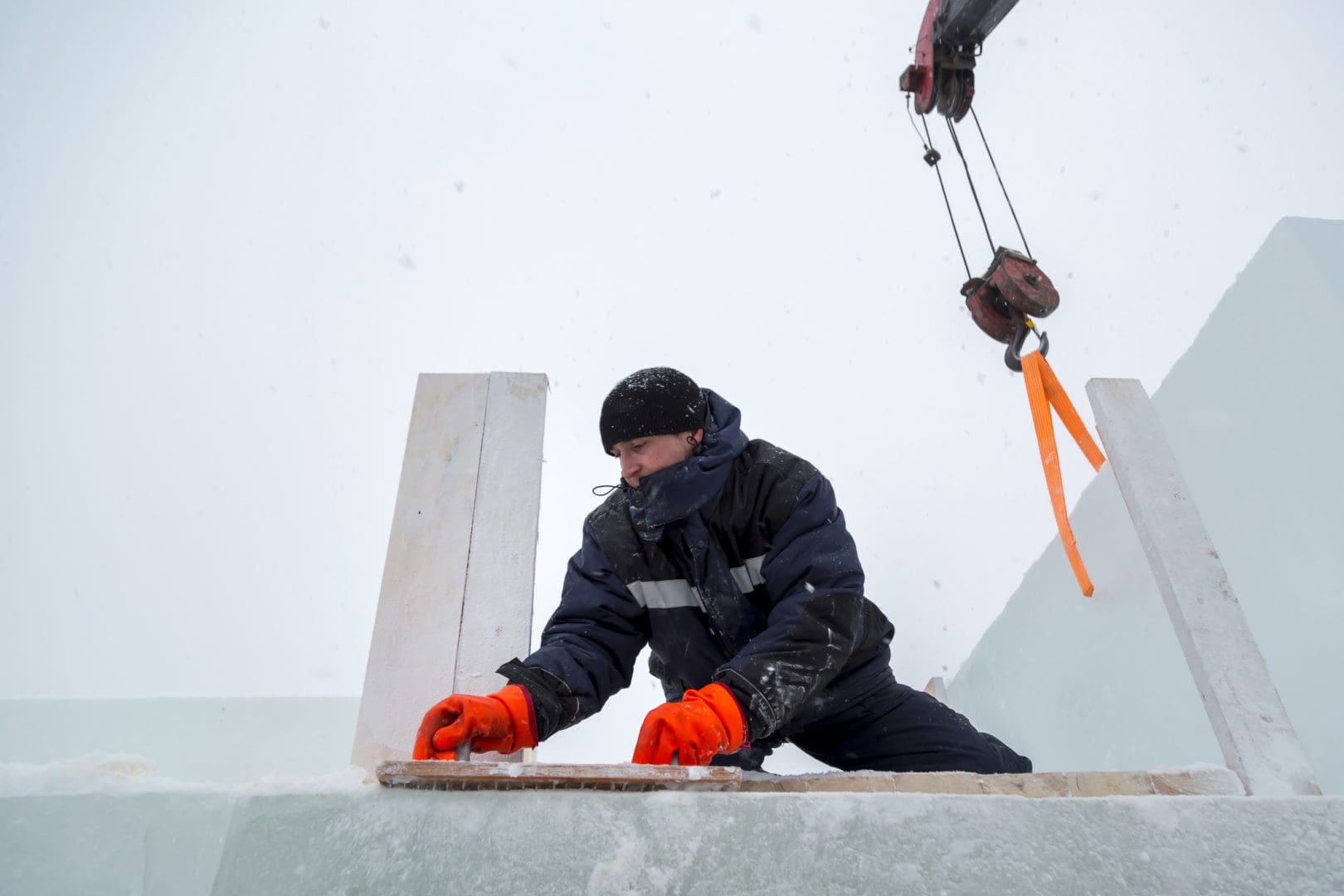 assembler-at-the-construction-site-with-a-brush-in-his-hands